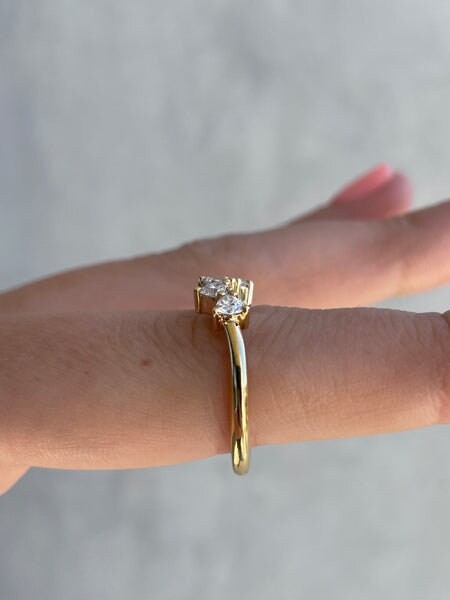 0.48 Carat Trillion Cut Curved Engagement diamond ring
